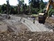 Gabions being put in place on the road connecting two provinces in Papua New Guinea