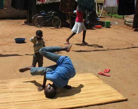 Children participate in a breakdance project by northern Ugandas Hip Hop Therapy Project and Breakdance Project Uganda