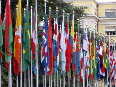 UN member flags fly in front of the Palais des Nations