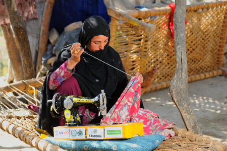 Pakistani woman sewing