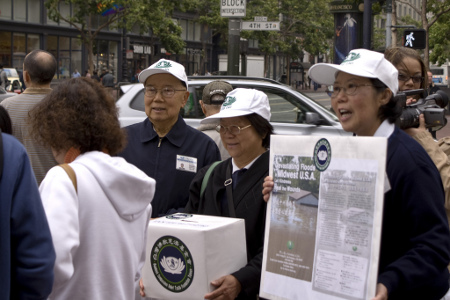 Members of the Tzu Chi Foundation hold a fundraiser