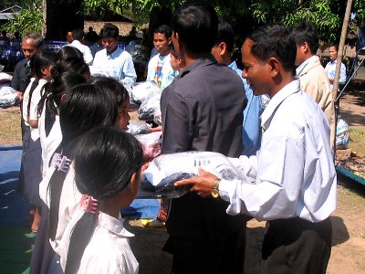 A local NGO in Cambodia distributes school uniforms
