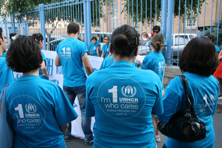 Staff of the United Nations High Commissioner for Refugees commemorate World Refugee Day