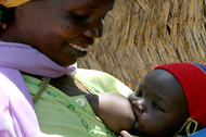 A mother breastfeeds her baby in northeastern Central African Republic