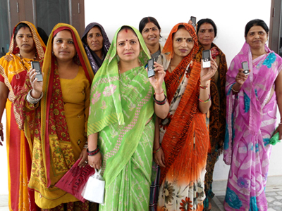 Women who benefit from ZMQ Development's Women Mobile Lifeline Channel. ZMQ Development is one of the nine awardees of the Millennium Alliance Awards, an initiative backed by the U.S. Agency for International Development. Photo by: ZMQ Development