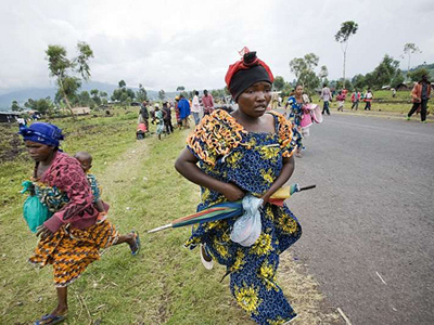 Women flee the fighting in the Democratic Republic of Congo